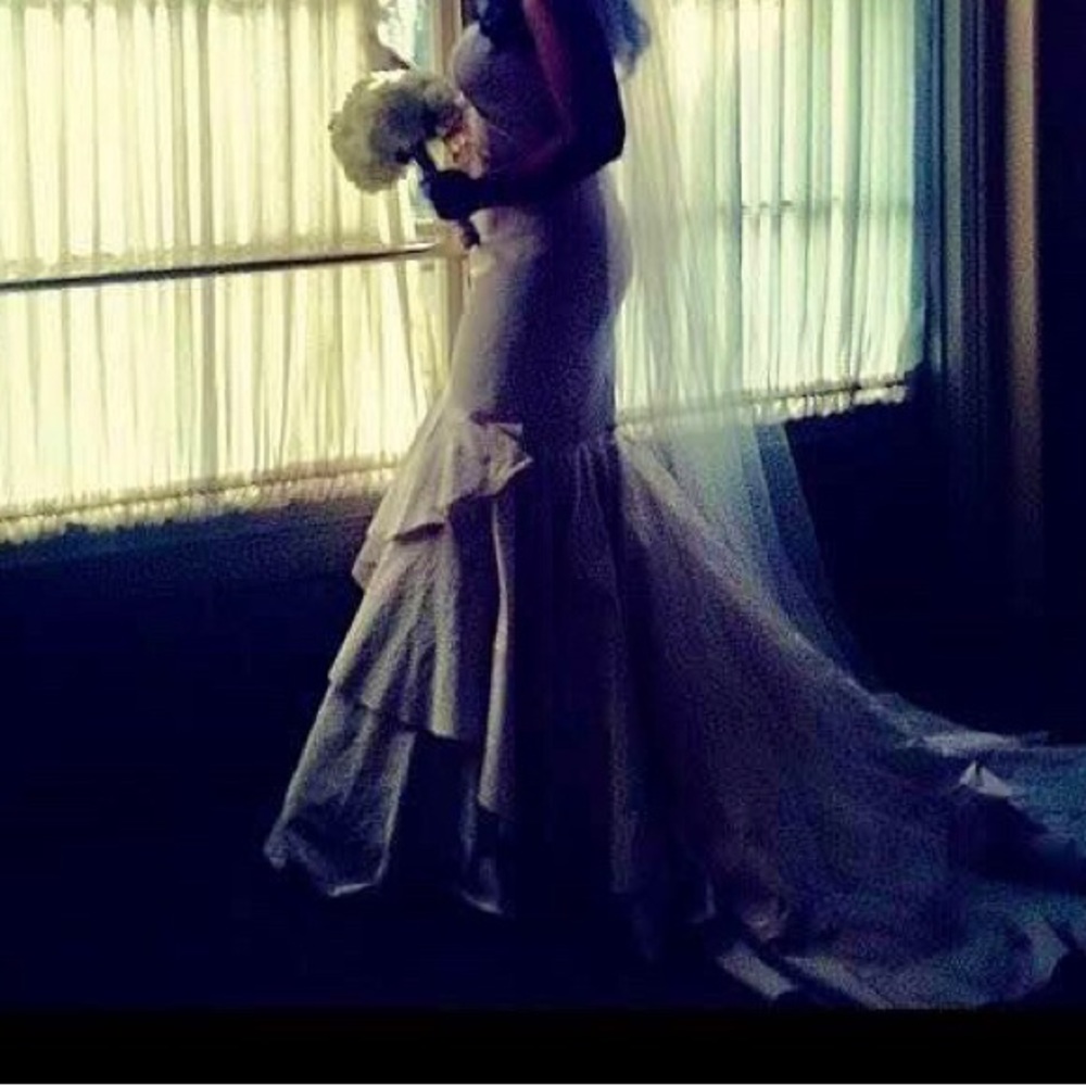 Watters wedding dress. Size 12. Color is wisteria.